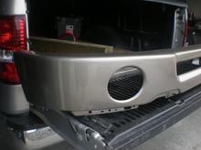 Right side of bumper.