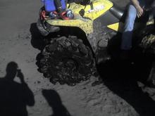 Got a little deep in some mud on the Kingquad. Those are 29.5s