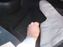 My aunt was apparently a girl after my own heart -- scraps of carpet, over rubber floor mats, over factory floor mats.....lol