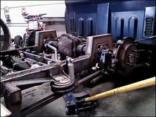 lifting the axle on the jack. this is how the frame looks to lay on the ground. the axle in the c- notch and no air in the back.