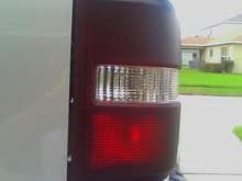 Close up of tail light with parking light on