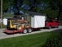 Moving a shed - all loaded up

Don't try this at home, notice the trailer is back loaded.