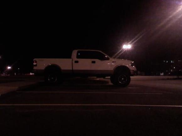 Truck on 37s and 8.5 inches of lift.