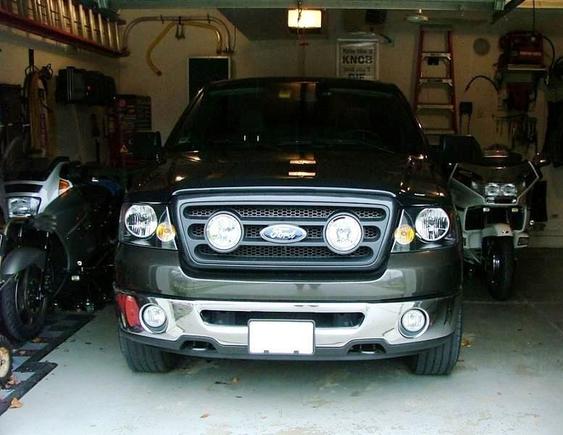 Hella Grille on Dark Stone Truck.
Lights are Ford HD lights