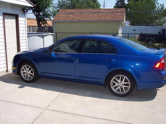 2011 Fusion SEL bone stock except for mud flaps and vent visors