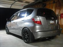 09 Fit base, Eibach springs, Konig wheels +45 offset, 205/50/16, 5mm spacers on the rear.