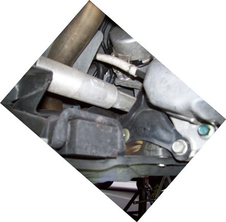 Removal of vibration canceling block makes access to the rear bolts easier