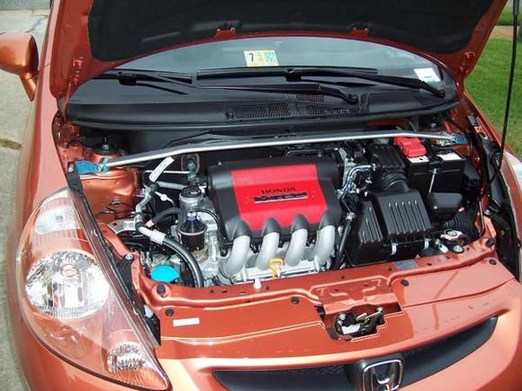 First mods, red intake cover and strut bar. 7/08