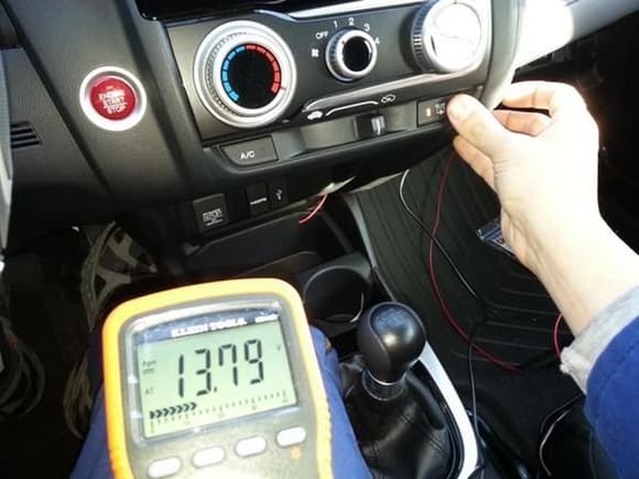 With defrost switch on, the rear defroster relay energizes and completes the circuit to the rear grid, thus sending 12 volts to the red wire I tapped in with.