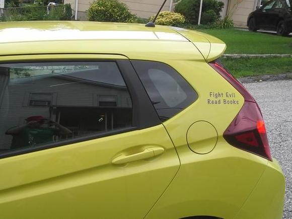 driver side rear: "Fight Evil, Read Books"