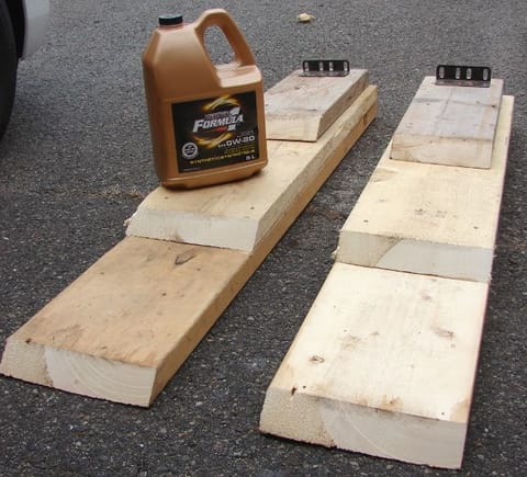 My 3 2x8 wooden ramps, used to change oil on a 2016 Honda Fit. Also Canadian-branded 0w20 oil.