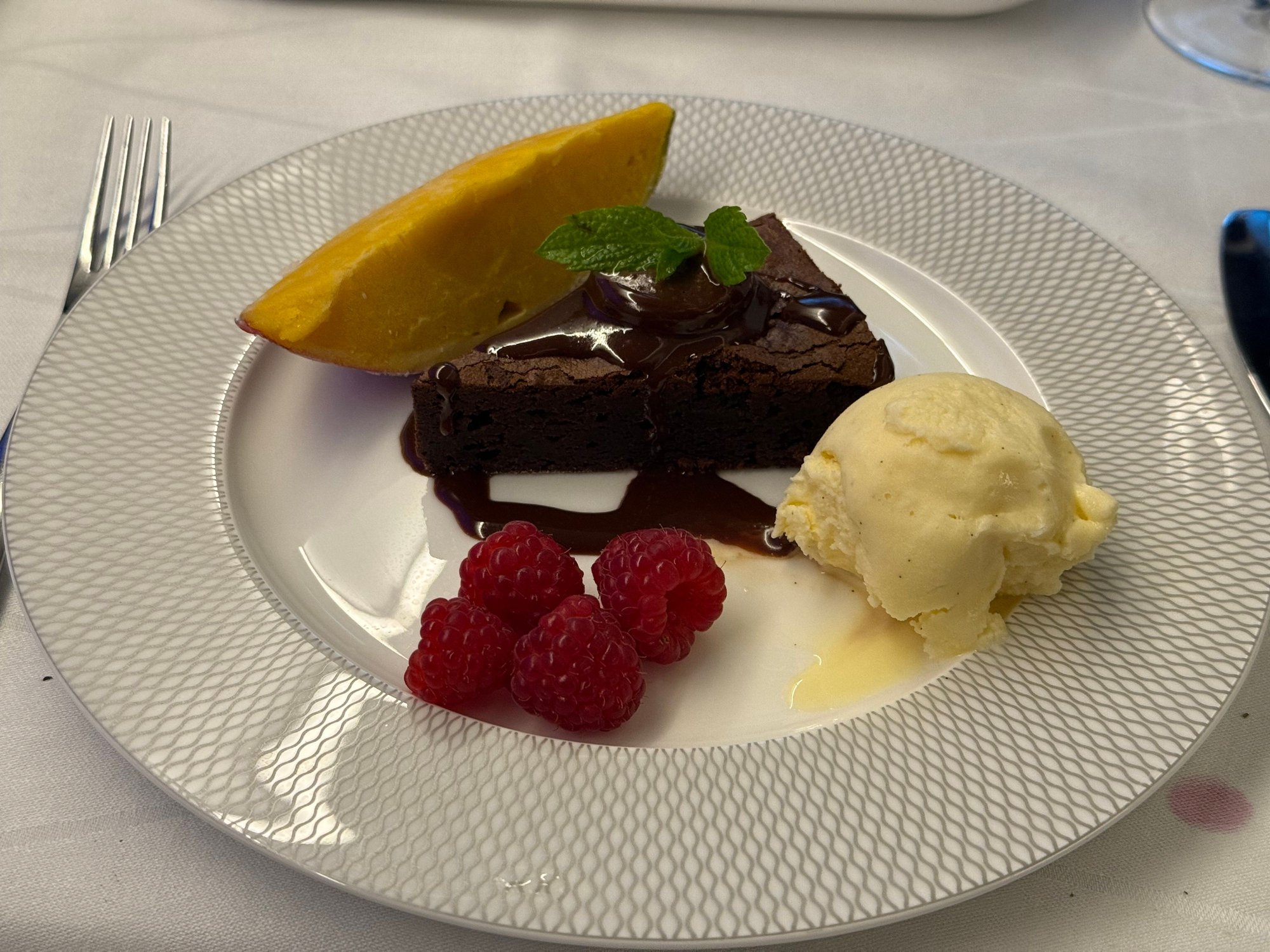 Chocolate tart with optional ice cream, the mango tasted like frozen mango sorbet, very good. 
