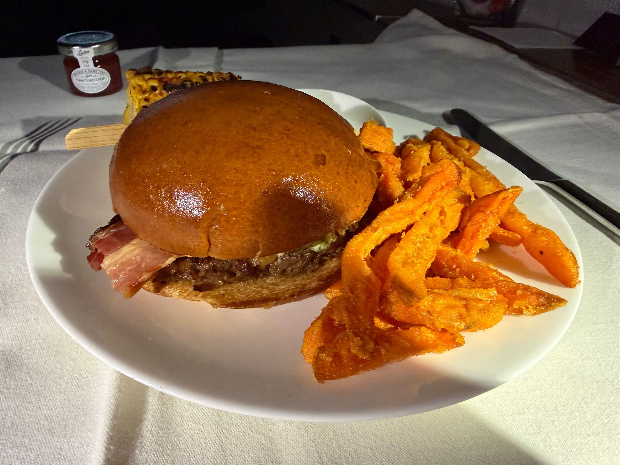 Pork Teriyaki Burger w/ spicy mayo and sweet potato fries 