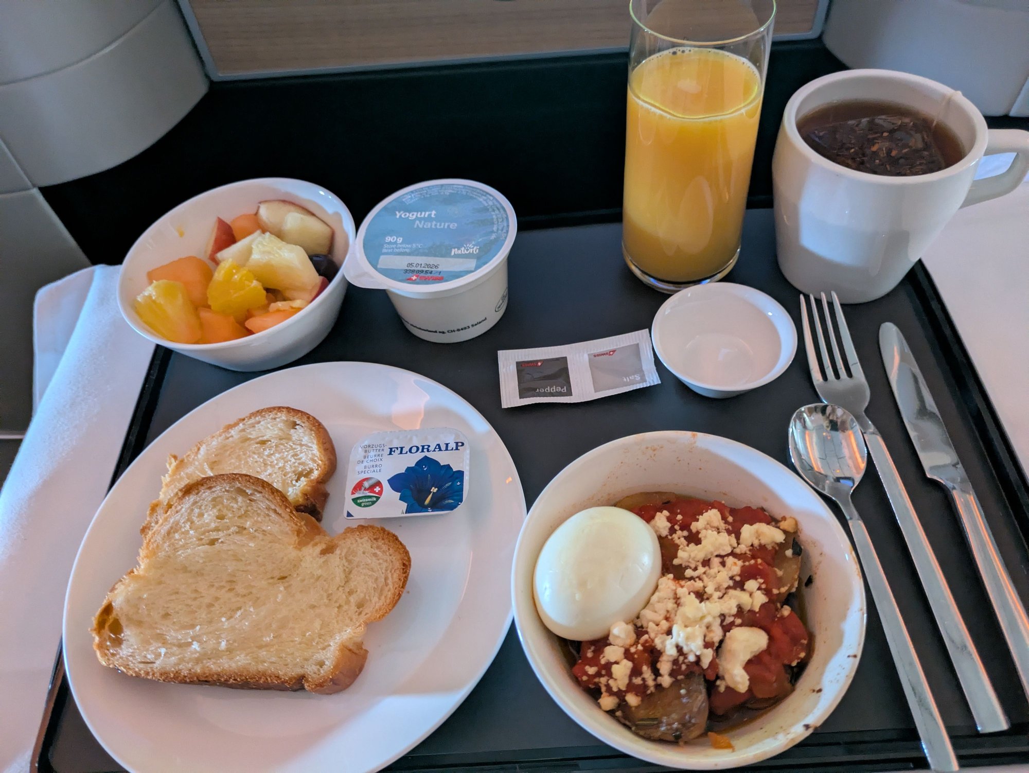 The right side dish is supposed to be a Shakshouka, yes, with a hard boiled egg. Not sure what joker thought this is what the dish should look and taste like. <img src=