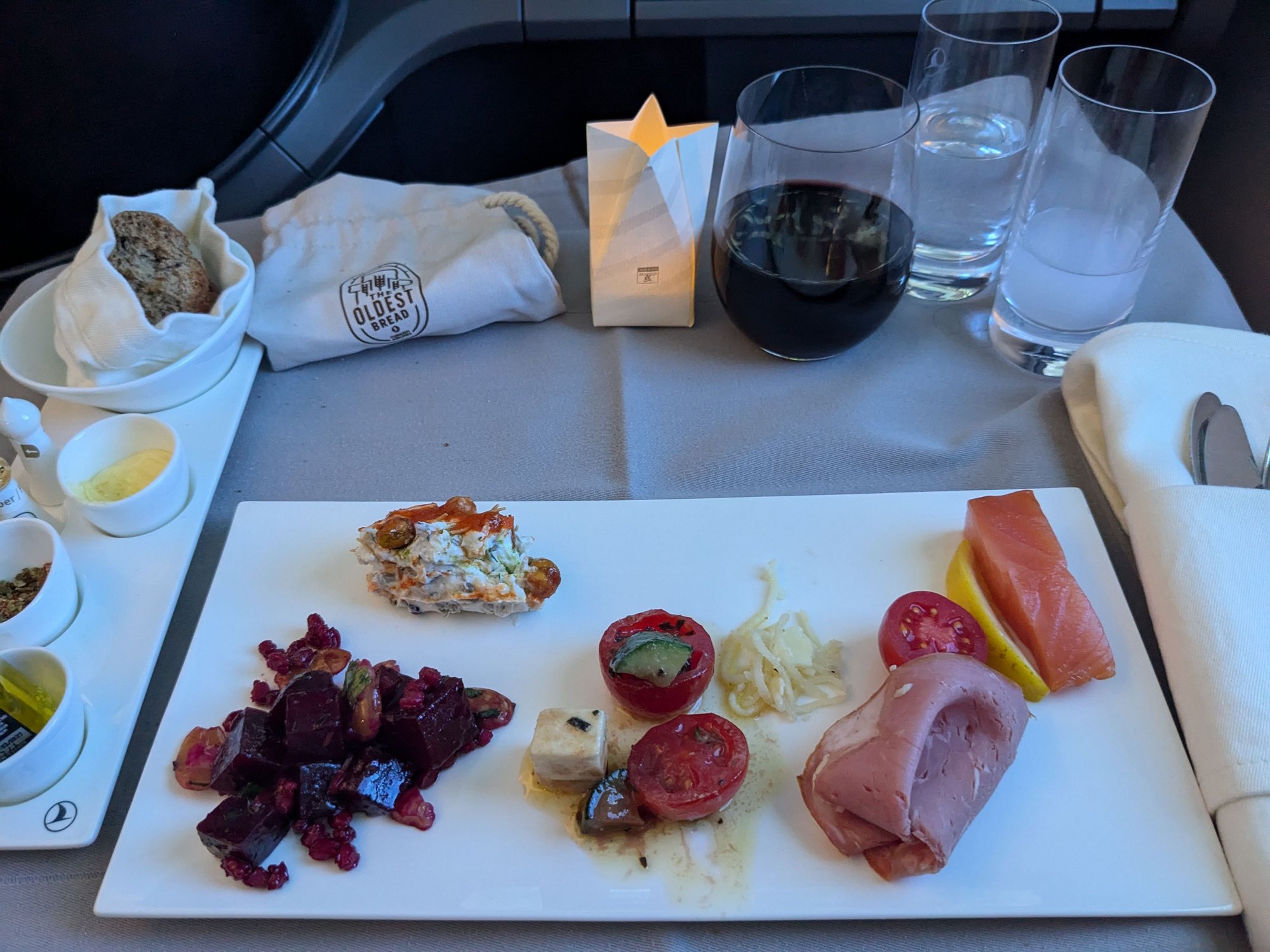 I was seated in the last row of the J cabin on this flight and asked for a little of everything left from the trolley. What I got was good, but nowhere near as good as the spread I got on the ex-YUL flight. Likely due to running out of some of the more popular items by the time the trolley reached my row.