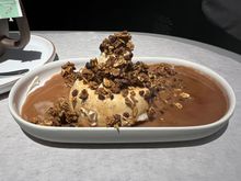Vanilla gelato - milk chocolate sauce, cacao nib granola.  Delicious!!!


