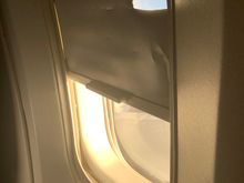 Busted window shade on an old 767 on DL. Didn’t really get the job done