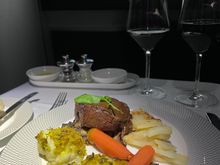 Seared fillet of beef with sautéed wild mushrooms, watercress, vine roasted tomato, green peppercorn sauce