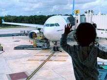 Waiting for our Air Transat A330-300 home from Cancun. 