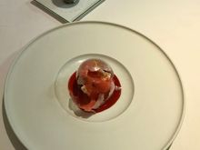 Broken sphere with strawberries within 