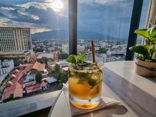 Cocktail of the day with a great view, delicious food, and a beautiful, calm, comfortable environment. Perfection.