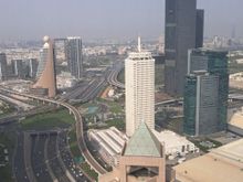 View from 4001. Dubai Frame in the distance. Fairmont hotel roof at the bottom. Bit hazy