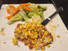 Chicken with mango salsa and seasonal vegetables