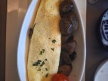 Omelette was ok.   Maybe just US catering. Was supposed to be cheese and veggie but seemed to be just cheese.  