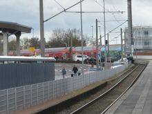 The next station is just around the curve as my next train arrives