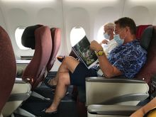 Albert Verlinde Reading the AmanDari brochure