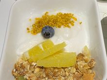 Coconut yogurt - seven-grain house-made granola, bee pollen, orange, blueberry, almonds