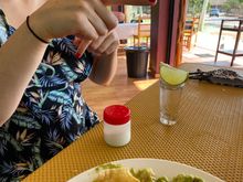 A tequila shot for the lady, on the house