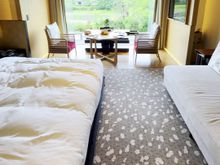 The size of "4 beds" occupying the room. 