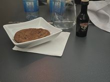 A cart with cookies and Baileys was rolled around. I went back to the J galley a few times to grab waters as pass throughs were limited. 

I requested a cappuccino from the FA and she said the machine may or may not be broken; no follow up. After about 10 minutes, I asked the pursuer and she said doubtful / the F FA was complaining to her about it, and walked away.  I then walked up to the galley and grabbed a water. 