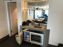 The wetbar area:
- Nespresso capsules machine
- Water cooker
- Mini fridge (2x water cartons)
- Wine fridge (empty)
* left, door to closet 