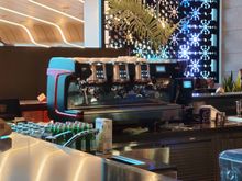 The espresso machine, operated by staff. There are some basic self service machines too.