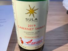Only alcohol options were Red / White and Beer.  A semi decent bottle of Sula sufficient. 