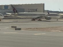 Grounded A350-900s parked along the runway