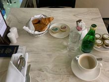 Starting with pastries, jam, butter and sparkling water. 