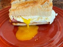 Ham, cheddar, egg and hot honey on toasted baguette. 