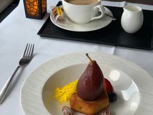 Poached pear with mascarpone. Overly sweet. Pear texture was well poached in wine. Would’ve loved some cream to make it a more coalesced dessert. 