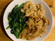 Hand pulled noodles with stir fried lotus root and some garlic flavored greens
