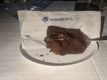 Since the cheesecake was so good on the outbound flight, I thought maybe, just maybe, the dessert would be palatable.  After a tiny nibble, the only palatable thing to do with it was to stab it so it couldn't come back to life after removal by the FA.