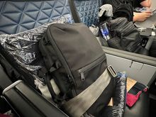 Is two seats/screens/tray tables better than a first class seat?