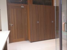 Lockers now on the same wall as the door.