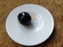 young walnut (hard shell hasn't formed) in syrup 

also there's watermelon rind (white part) crinkle-cut, crunchy , also in syrup