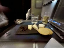 Todays cheese plate. Not as good as the outbound one. Sorry the photo is blurred. 