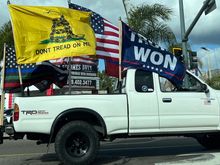 Russian flag on driver’s side partially obscured.