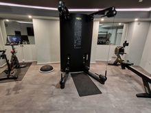 Part of the gym. The floor doesn't quite meet Hilton standards, hence the small rug, but it doesn't help much.