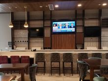 Bar and seating at tables nearby when busy